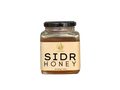 Jar of Sidr Honey with a black lid on a white background